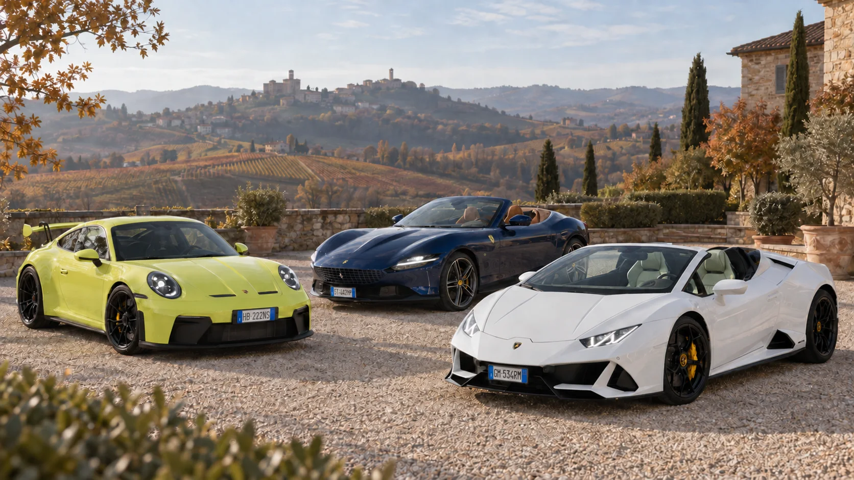 Porsche 911 GT3, Ferrari Roma Spider e Lamborghini Huracán riunite in una corte nelle Langhe; visual illustrativo da vetture Rial